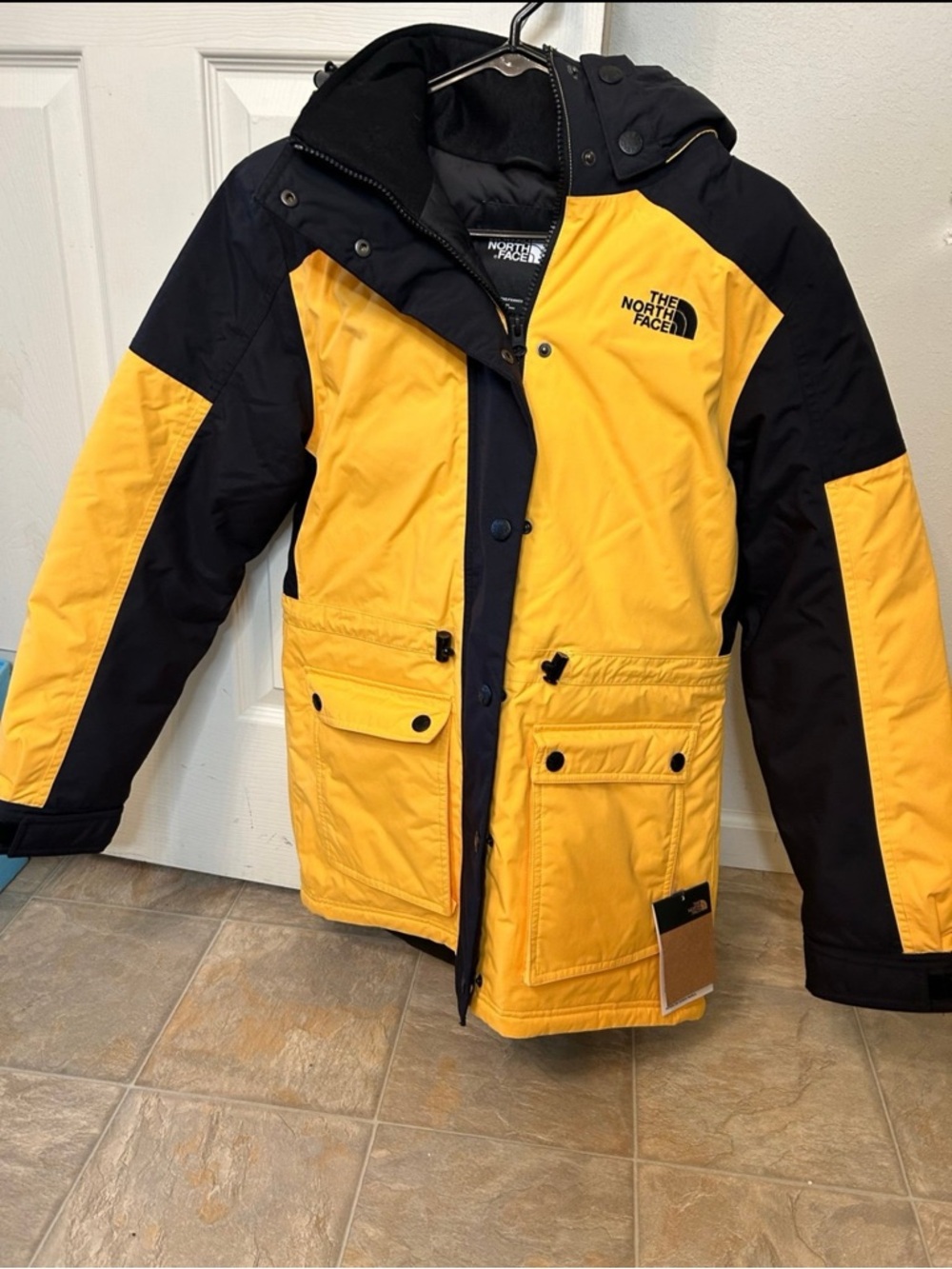 The North Face Kids Yellow and Black Insulated Hooded Puffer Jacket